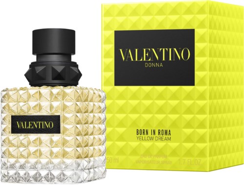 En parfyllflaska och gul förpackning med svart etikett, har texturerad design och varumärkesnamnet Valentino, Donna.