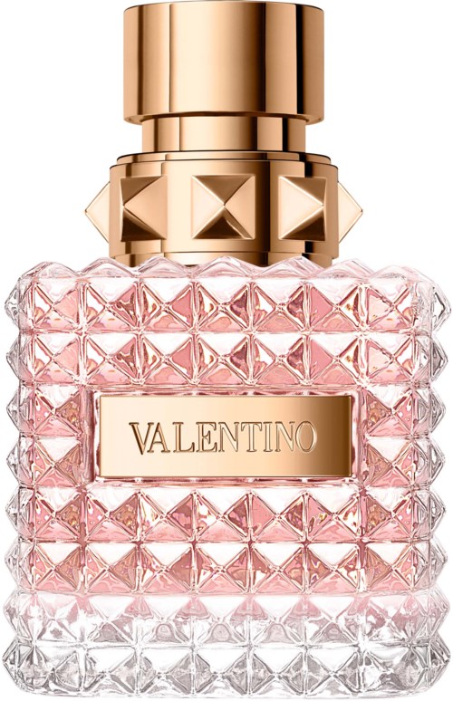 Ein rosa Parfühlschrank mit goldener Kappe und dekorativer Textur, beschriftet 'Valentino.'