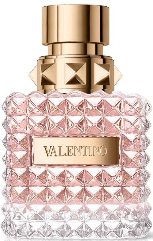 Eine Parfüfflasche mit rosa, strukturierter Diamantoberfläche, goldener Kappe und Valentino-Label.