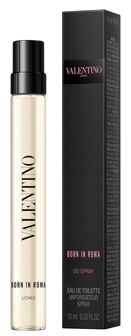 En Valentino-parfymflaska med svart spraylock, bredvid en lång svart låda med rosa och vitt text.