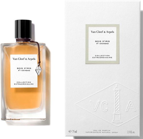 Eine Glas-Parfüfflasche und weiße Box mit schwarzem Text, Markenname Van Cleef & Arpels, Bois D'Isis, Extraordinaire.