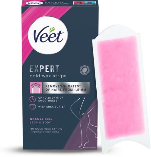 Box of Veet cold wax strips for short hair removal, with pink wax strips and instructions.