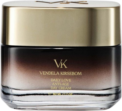 A jar with a gold lid and dark brown to light brown fading body, labeled 'VK Vendela Kirsbom Daily Love Anti-Age Day Cream.'