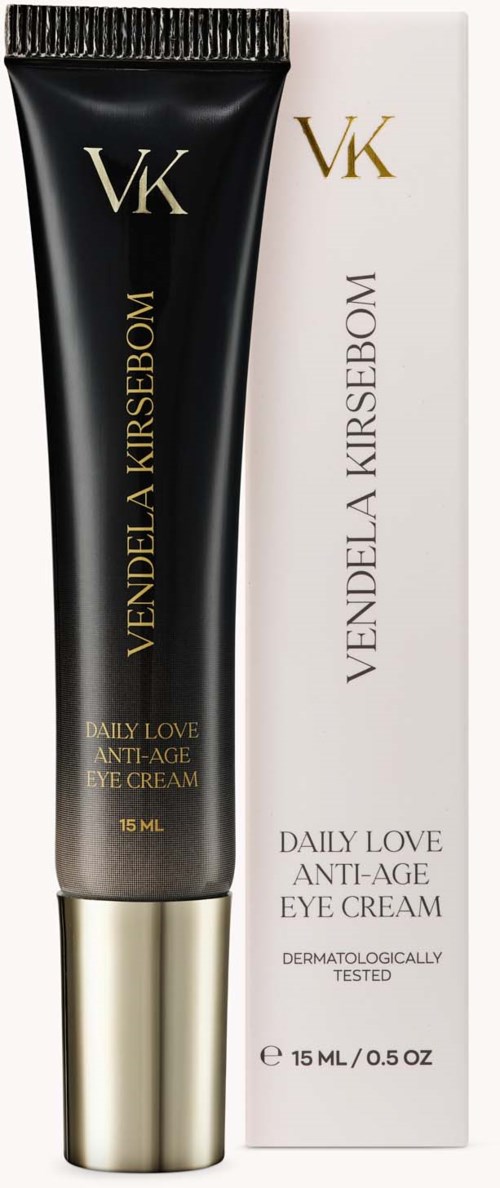 A black and gold tube of eye cream next to its white box, both labeled daily love anti-age eye cream.