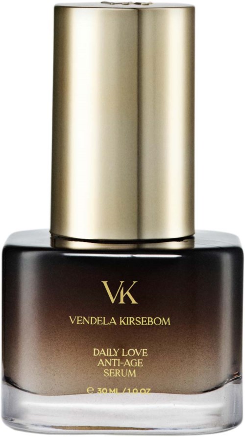 A black and gold bottle labeled 'VK Venda Kirsobom Daily Love Anti-Age Serum' with a gold cap.