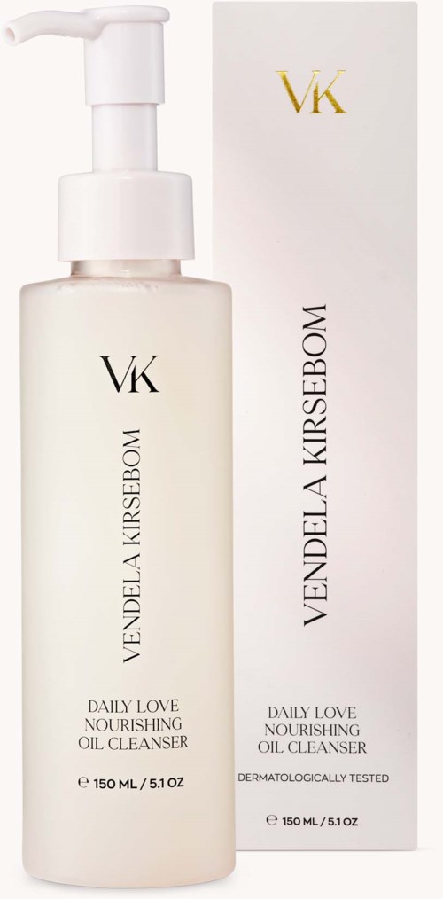 A white bottle of VK Vendela Kirsebom nourishing oil cleanser with a pump, next to its matching box.