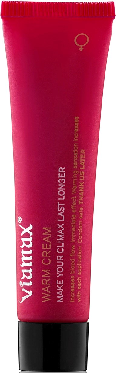Eine rosa Tube mit der Aufschrift 'Vitalux Warm Climax Last Longer' Creme für längere Wärme und sinnliches Vergnügen.