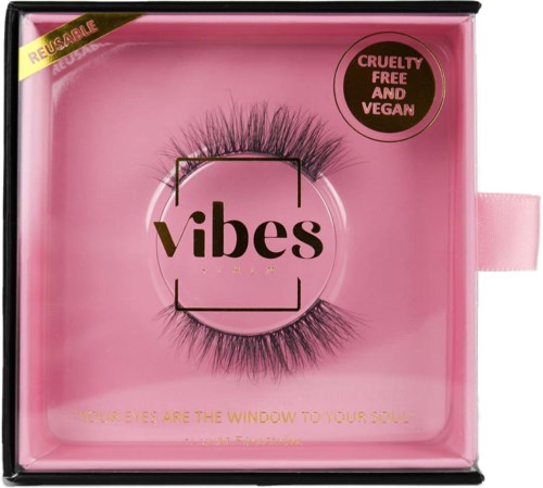 Pink box with false eyelashes, label says 'vibes,' cruelty-free, vegan, reusable, and eye quote.