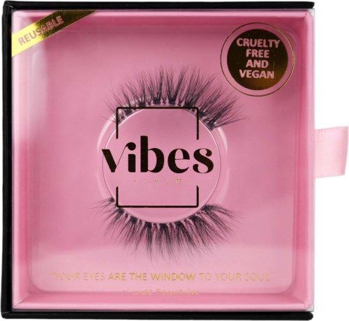 Pink box with fake eyelashes, logo 'vibes', and labels about cruelty-free and vegan products.
