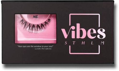 The box displays pink and black colors, with a false eye and the words "vibes" and "STHLM".