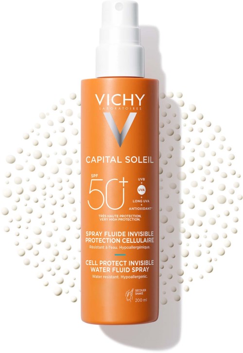 Orange bottle of Vichy Capital Soleil summer sun protection spray with SPF 50+ and cell protection label.
