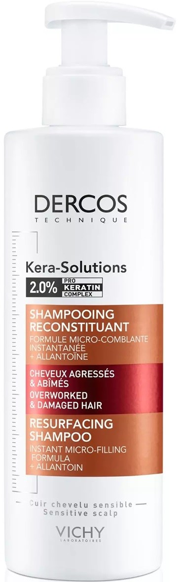 Eine weiße Flasche mit Pumpspender, gekennzeichnet 'DERCOS TECHNIQUE,' enthält Shampoo für beschädigte, empfindliche Kopfhaut und Haare.