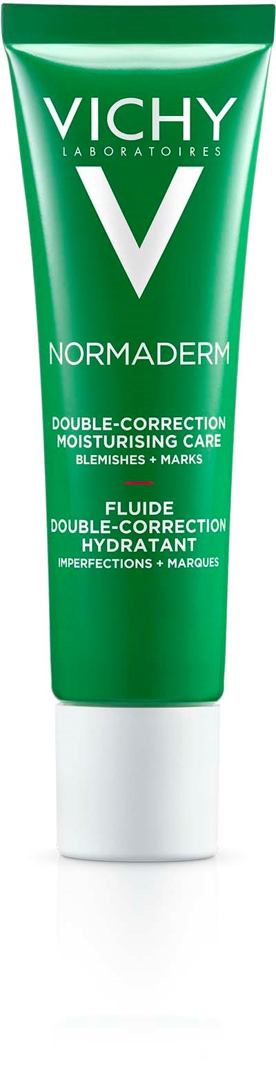Grön tub med Vichy Normaderm dagkräm för hudblemor och märken.