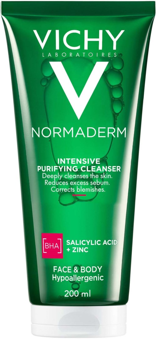 Ein grüner Becher Vichy Normaderm Tiefenreinigung für Gesicht und Körper mit BHA und Zink, geeignet für fettige Haut.