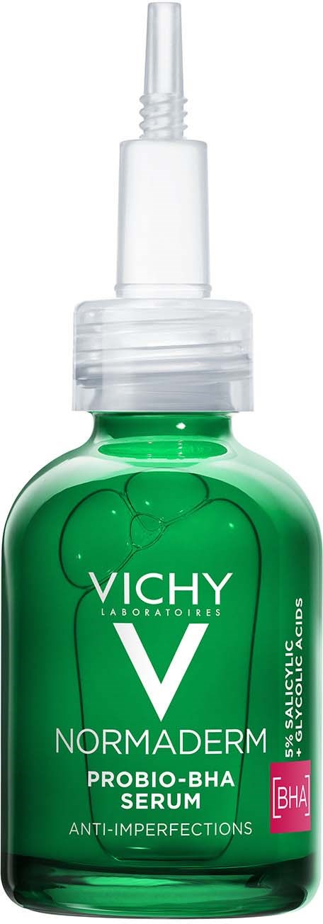 Eine grüne Vichy Normaderm Serumflasche mit Sprühkopf für Hautpflege. Beschriftet als gegen Unreinheiten und probio-BHA.