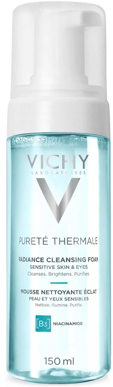 Eine Vichy Gesichtsreinigungs-Schaumflasche mit Pumpe, klare blaue Flüssigkeit und Etikett mit Produktdetails.