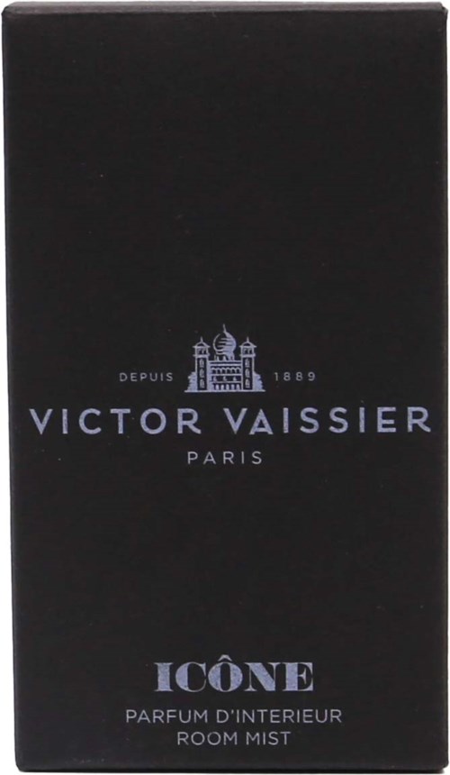 En svart eske med blå og hvit tekst, med en bygningslogo, parfymermerket Victor Vaissier, Paris, og parfymenavn ÉON.