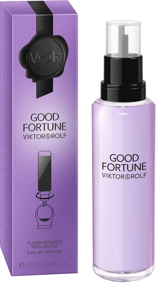 En lila parfyllflaska med svart lock och spraymunstycke, bredvid en matchande lila box med produktinformation.