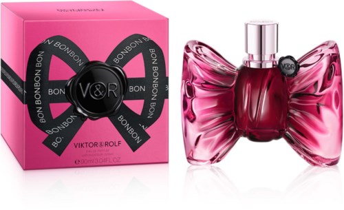 Roze parfumfles met strikvorm en roze doos met zwarte en roze ontwerpen.