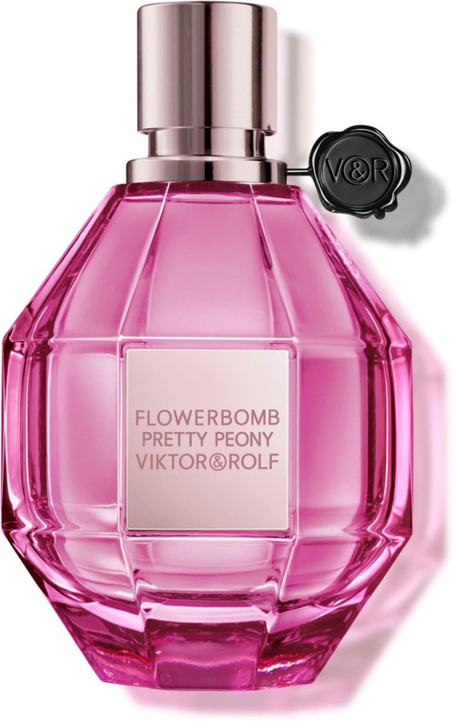 Roze parfumfles met zilveren dop en zwart zegel, gelabeld Flowerbomb Pretty Peony Viktor&Rolf.