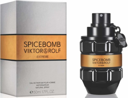Een parfumfles en doos met label Spicebomb Viktor & Rolf Extreme, zwart en oranje ontwerp, stijlvol en opvallend.