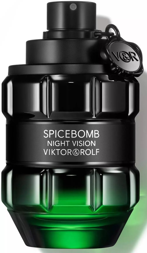 Een zwart flesje met Spicebomb Night Vision van Viktor Rolf, met een groene gloed onderaan en een sleutelhanger.