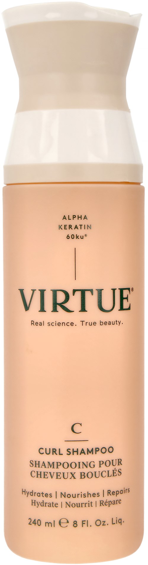En flaska Virtue Curl Shampoo, med beige och vit lock, innehåller hårvårdsprodukten för lockar.
