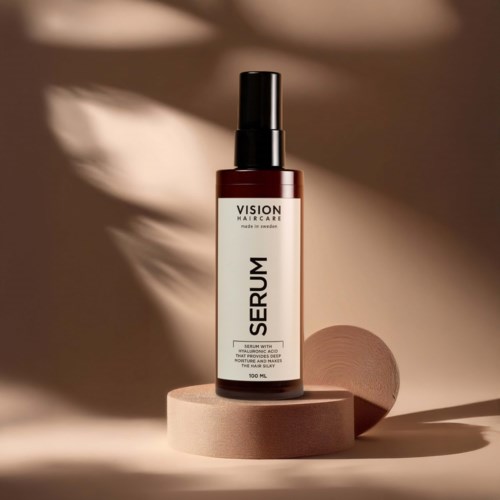 A brown bottle of serum on a beige pedestal with soft shadow and light. Simplistic and elegant design.