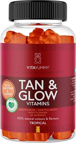 Flaska med orange gummibjörnar märkt "Tan & Glow Vitamins" med svart lock, rosa etikett och tropical tema.