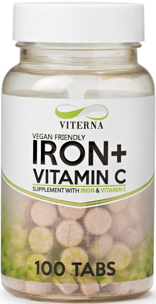 A clear plastic bottle containing pink and yellow tablets, labeled for iron and vitamin C supplements, with a white cap.