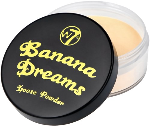 Mustan säilykepakkauksen päällä keltainen teksti ja se sisältää Banana Dreams hanhipölyä, hieman auki.