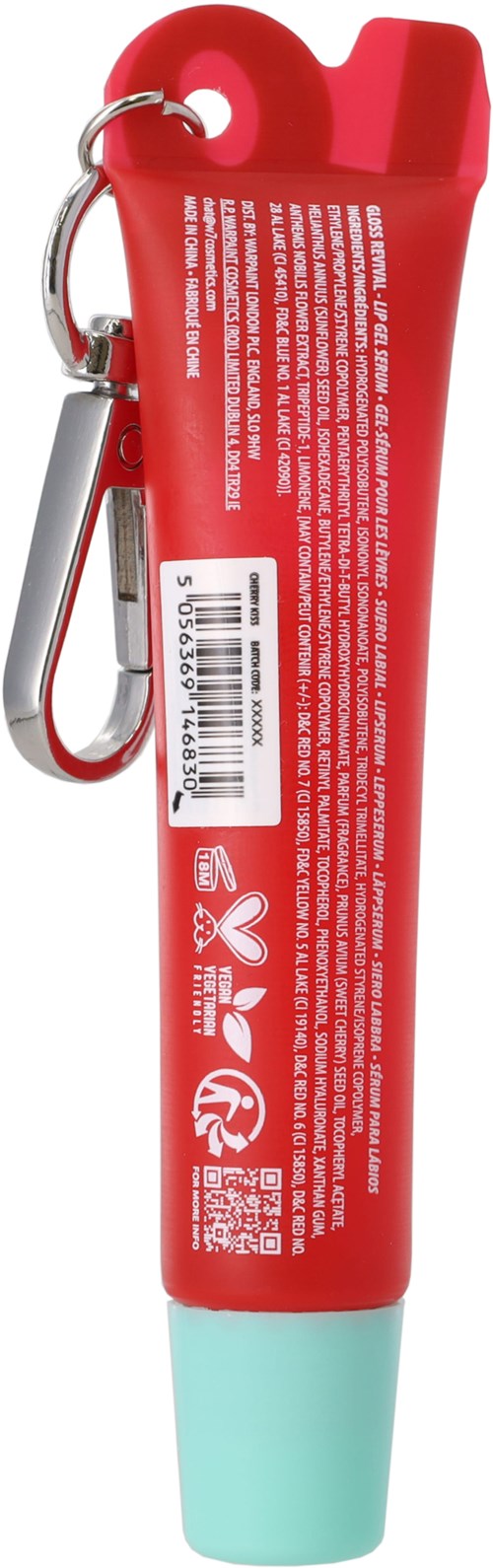 Long red tube with a label, a key ring, and a clip, possibly a whistle or a similar object.
