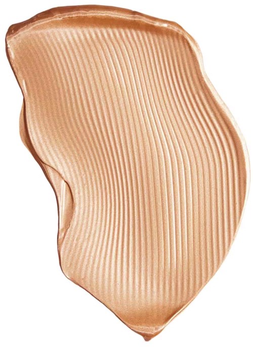 En provbit av skimrande, beige-färgad makeup med horisontella räfflor och en kurvig form.
