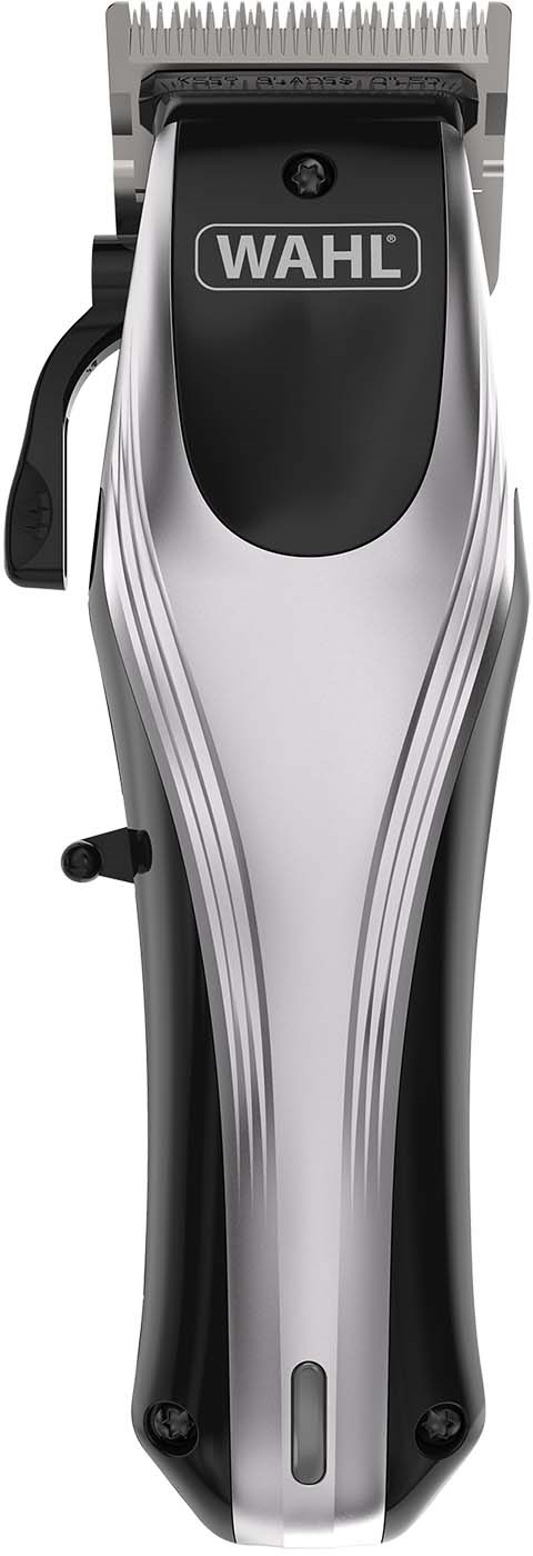 A Wahl electric hair clipper with a black and silver design and a power button.