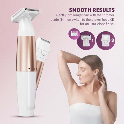 A woman shows her armpit after using an electric shaver with tips for smooth results.