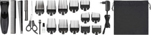 Een set haarverzorgingsgereedschap met trimmers, scharen, kammen en een netsnoer, gerangschikt op een strip.