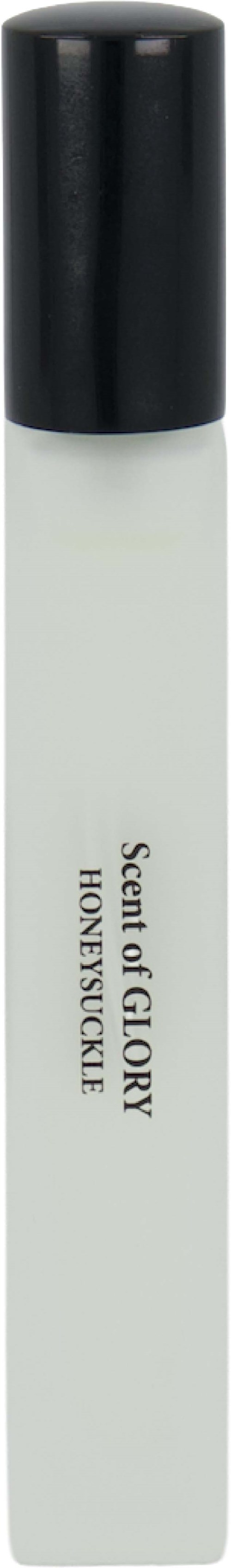 A white room spray bottle with a black cap, labeled scent of glory honeycicle.