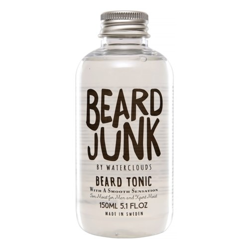 Klare Flasche mit Barttonic, silberner Verschluss, beschriftet 'Beard Junk' und als glattes Gefühl für Männer.