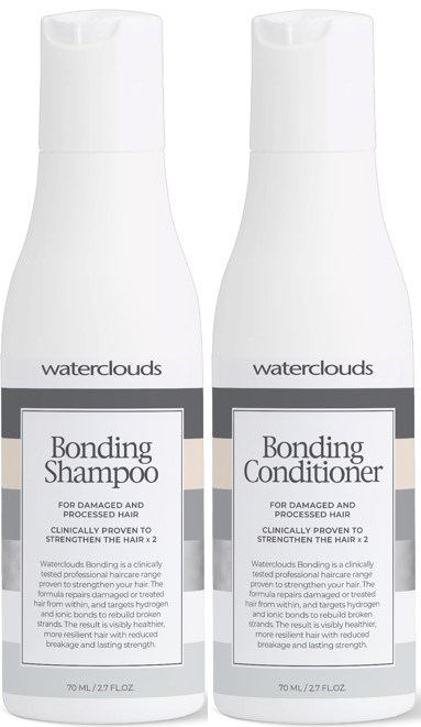 Twee witte flessen gemarkeerd als Bonding Shampoo en Bonding Conditioner, bedoeld voor beschadigd haar, met eenvoudige witte en grijze labels.