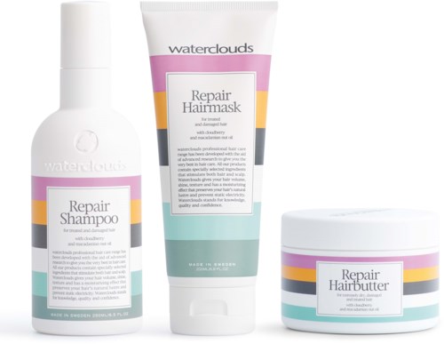 Three hair products: shampoo, hair mask, and hair butter from Water Clouds for damaged hair. Simple packaging with pastel colors.