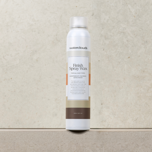 A white spray can labeled Waterclouds Finish Spray Wax stands on a neutral surface against a plain background.