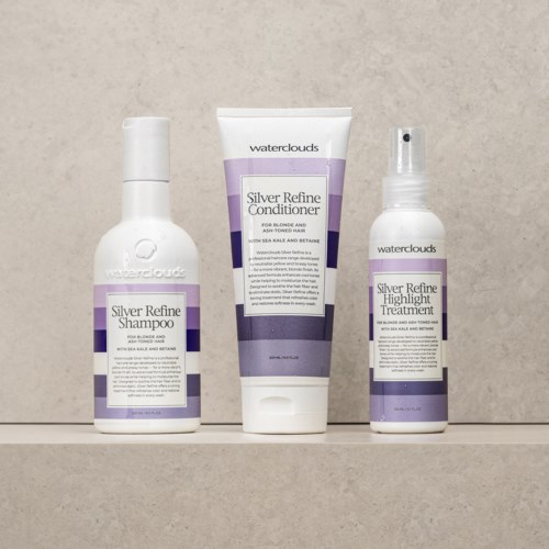 Drei Haarpflegeprodukte von Waterclouds: Shampoo, Conditioner und Behandlung, alle mit 'Silver Refine' gekennzeichnet.
