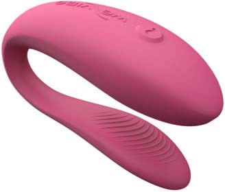 Ein rosa, gebogener, glatter Erwachsenenspielzeug mit Bedientasten, für Komfort und Vergnügen.