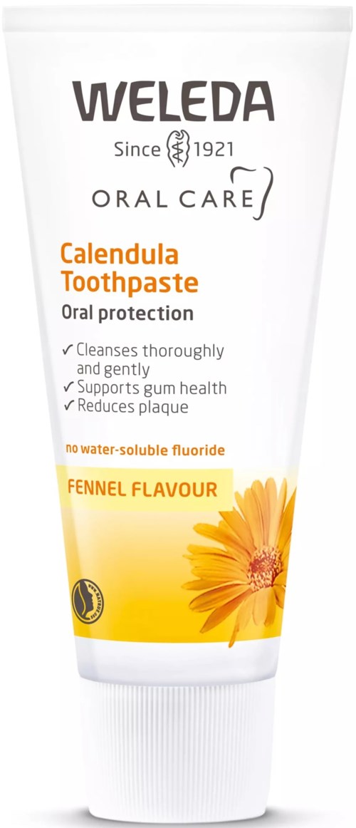 Eine Tube Weleda Calendula Zahnpasta mit einem Orange und Gelb Blumente Design, fördert die Mundgesundheit und Schutz.