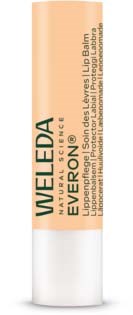 Eine beigefarbene und weiße Tube mit Welleda Augenbalsam steht aufrecht, Text auf der Vorderseite.