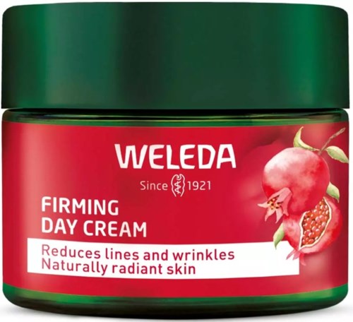 Ein grüner Tiegel mit Weleda Festigungs-Tagescreme, rotes Etikett mit Granatapfel und Hinweis auf Wrinkle-Reduktion.