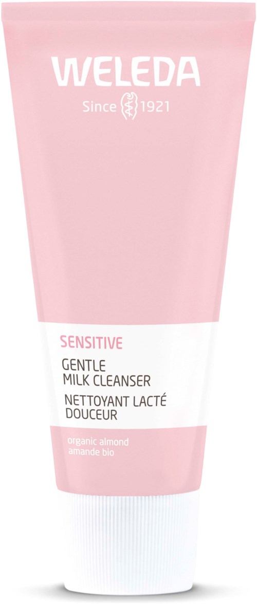 Rosa Tube mit Weleda Sensitive Gentle Milk Cleanser, Bio-Mandel, mit weißem und pinkem Text.