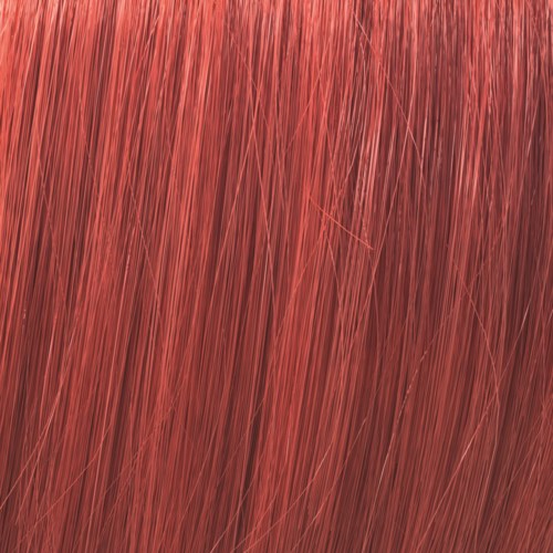 Close-up van roodbruine haarstrengen, dicht opeengeperst en licht glanzend.