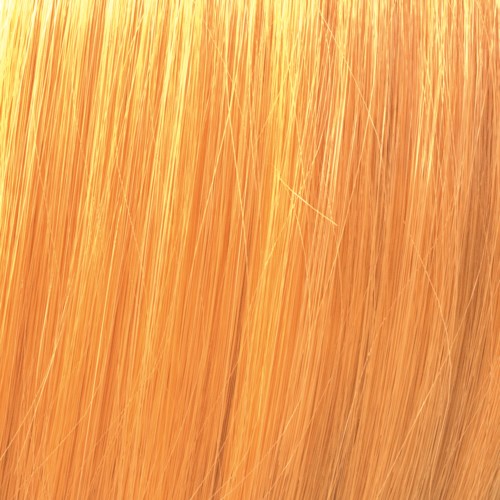Närbild av orange och gula strån eller gräs, med en texturerad, glansig yta.