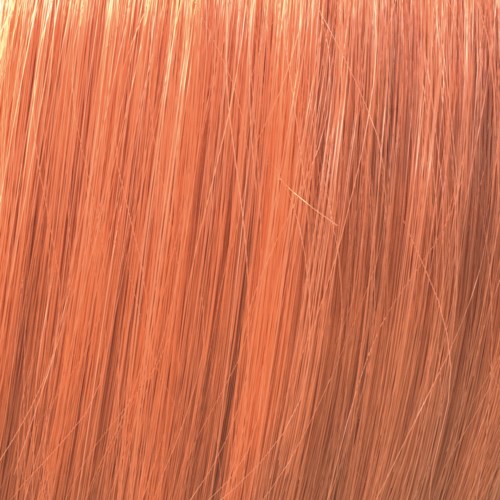 Close-up of long, straight, reddish-brown hair strands.